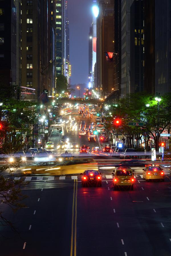 Looking down 42nd Street at night Photograph by Merijn Van der Vliet