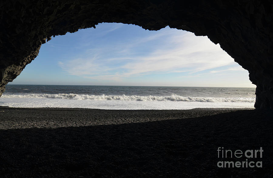 Looking Out of a Grotto on Reynisfjara Beach in Iceland Photograph by DejaVu Designs