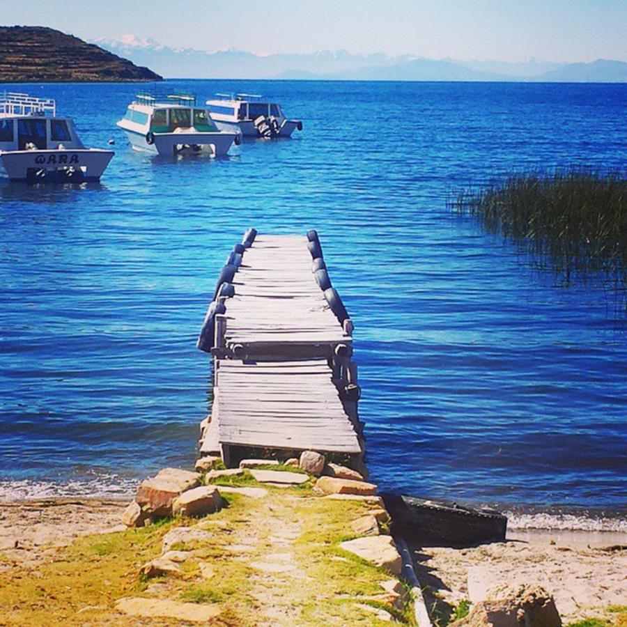 Travel Photograph - Looking Out Over Lake Titicaca Towards by Dante Harker