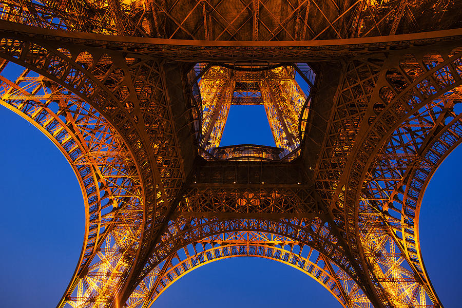 Eiffel Tower Photograph - Looking up at the Eiffel Tower by Andrew Soundarajan