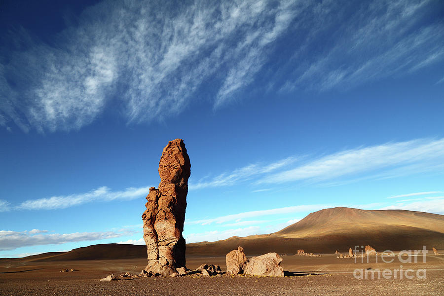 Los Monjes de la Pacana and Windswept Skies Chile Photograph by James Brunker