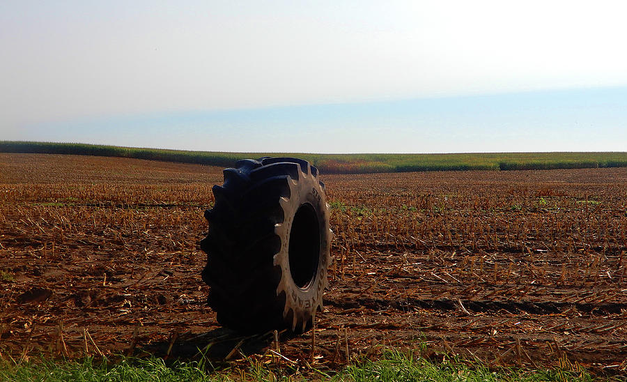 Farm Photograph - Lost Big Tire by Tina M Wenger