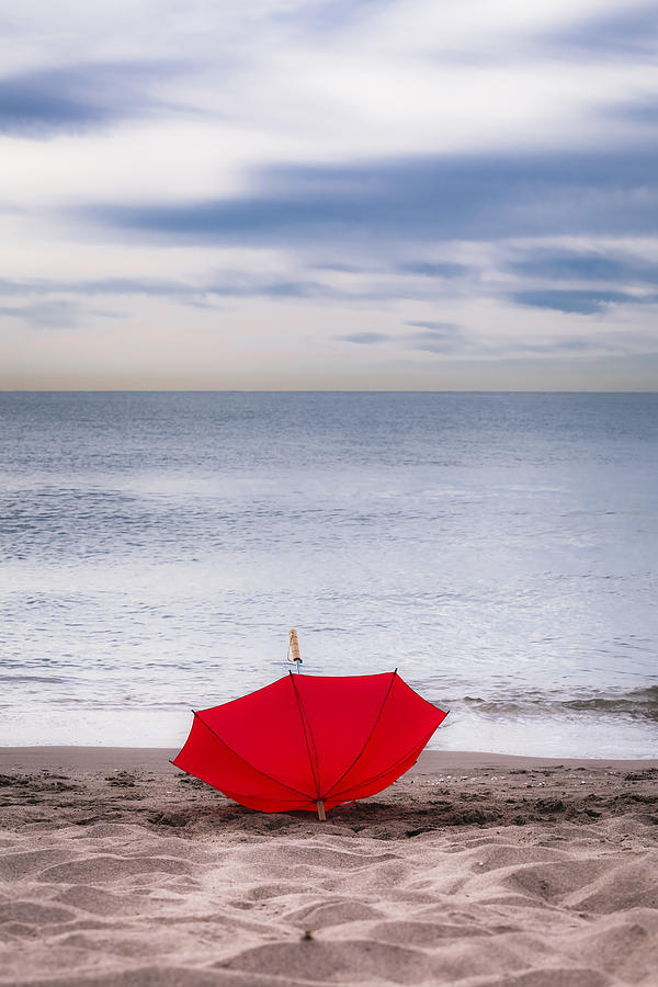 Lost umbrella Photograph by Maria Heyens