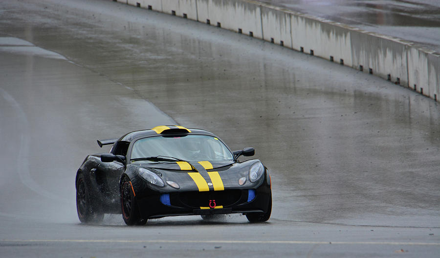 Lotus Exige on Wet Track Photograph by Mike Martin