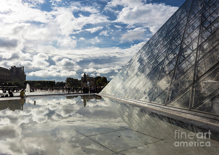 Louvre palace and pyramid in Paris Photograph by Didier Marti