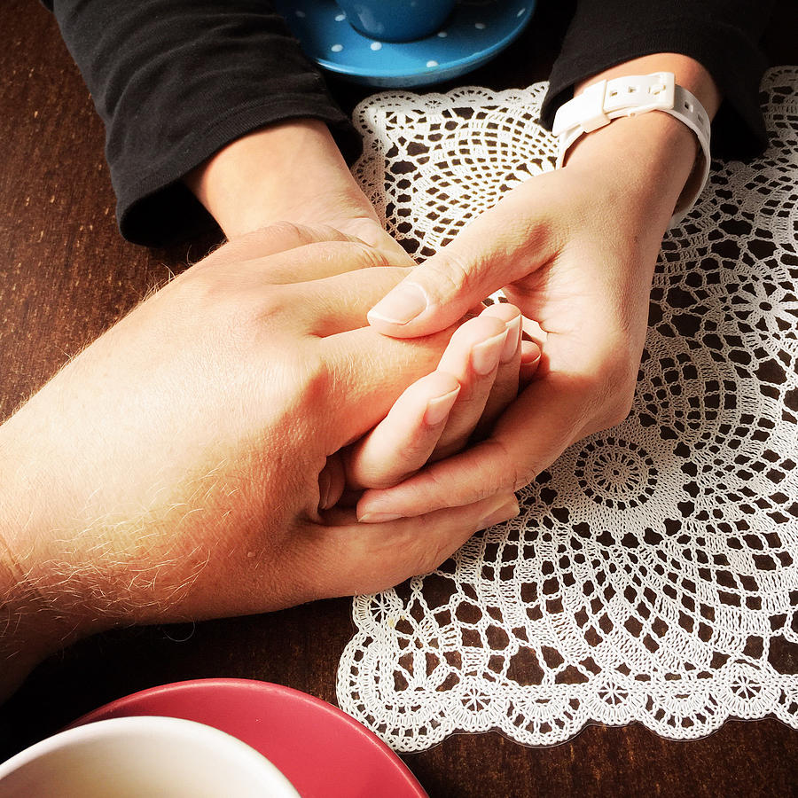 Coffee Photograph - Love - a couple holding hands by Matthias Hauser
