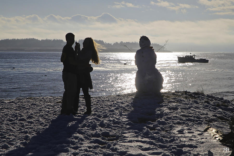 Love and the Snowman Photograph by John Meader