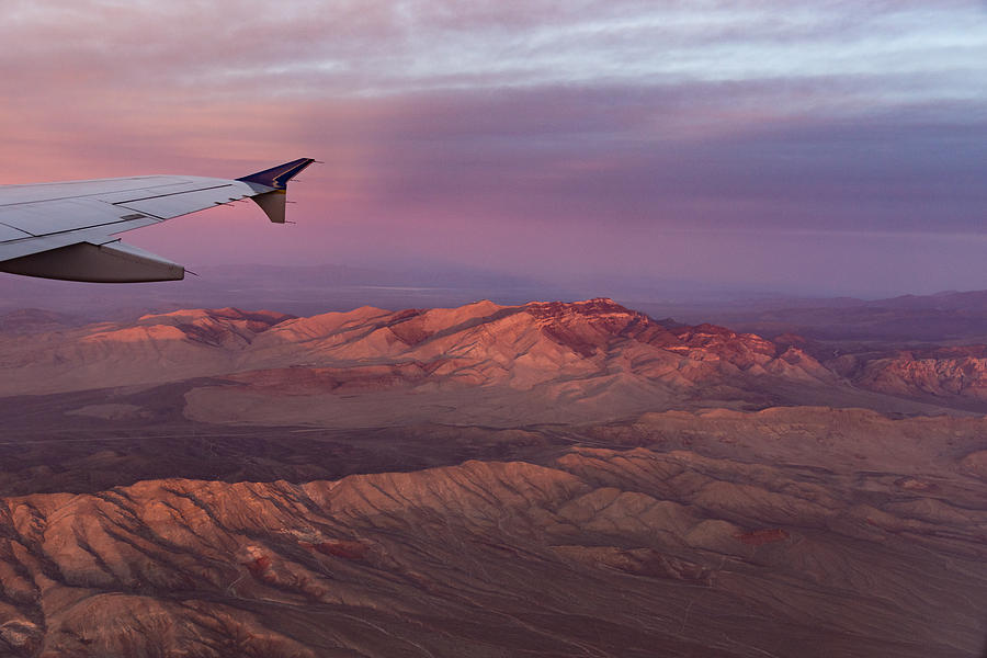Loving the Window Seat - Pink Dawn Over the High Mojave Desert Photograph by Georgia Mizuleva