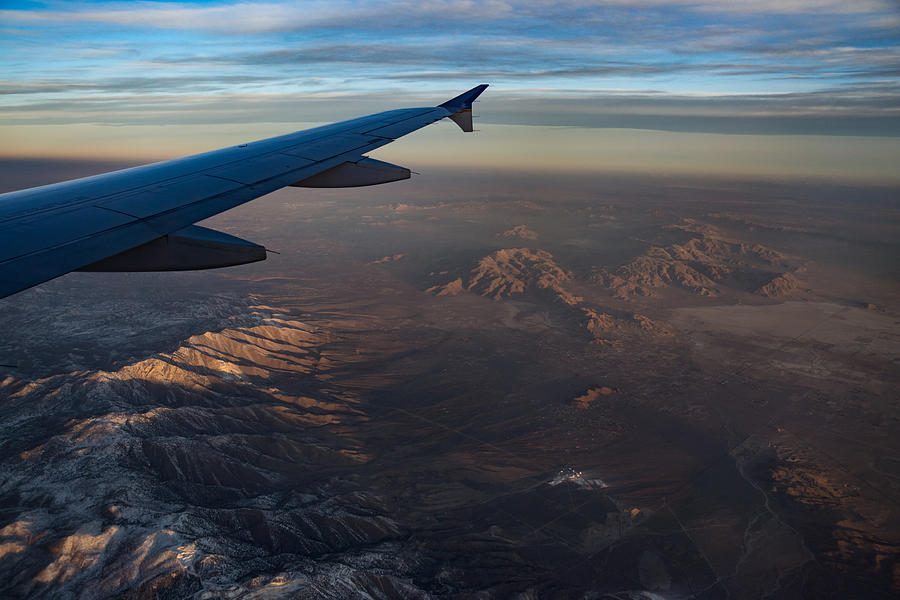 Loving the Window Seat - Sunrise Flight Over the High Mojave Desert Photograph by Georgia Mizuleva