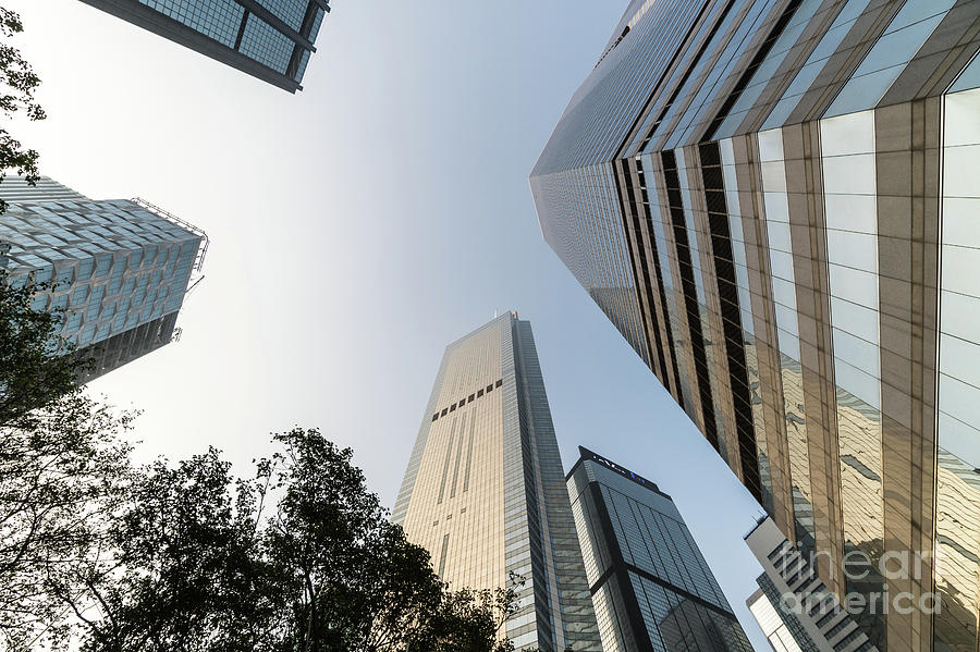Low angle view of skyscrapers in Wan Chai business district in H Photograph by Didier Marti