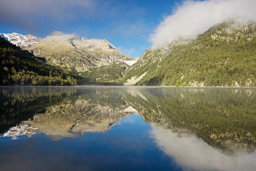 Low clouds and rising mist over Lac doredon Photograph by Stephen Taylor