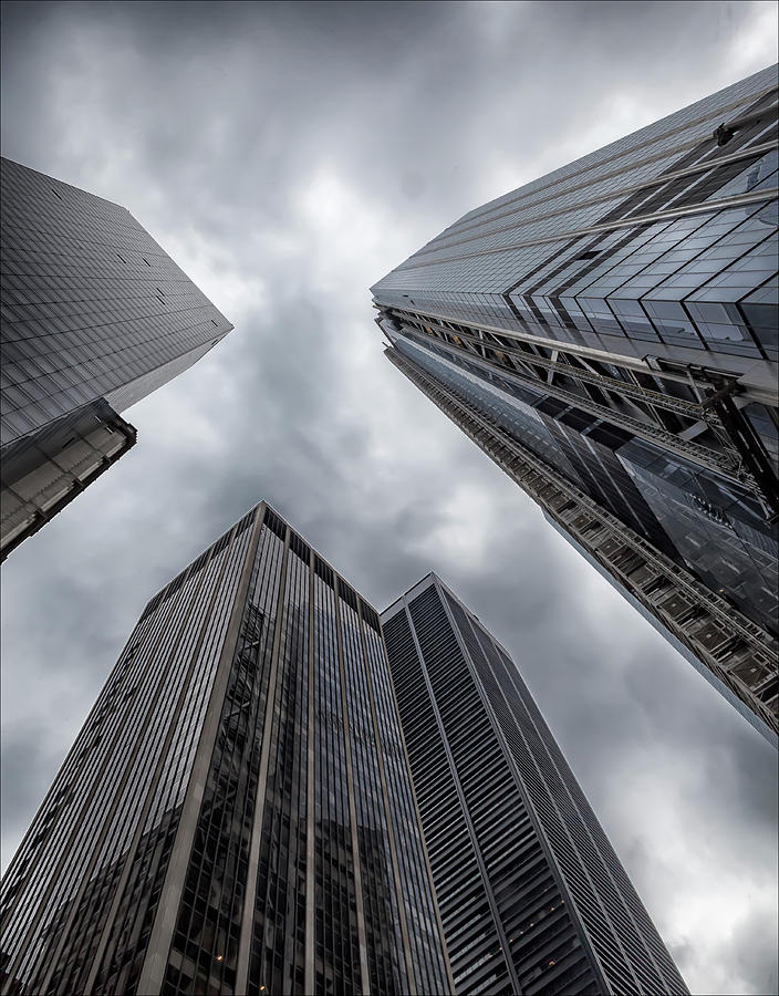 Lower Manhattan Office Buildings and Rainclouds Photograph by Robert Ullmann