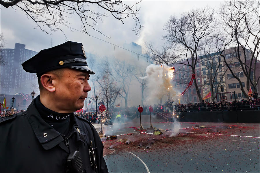 Lunar New Year NYC 2017 Auxiliary Policeman and Fireworks Photograph by Robert Ullmann