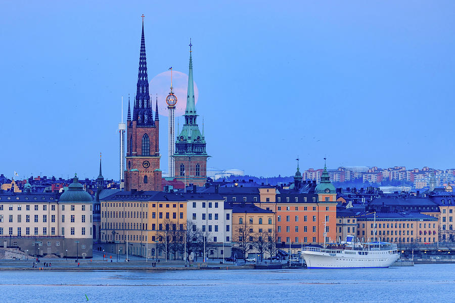 Full Moon Photograph - Lunar teamwork Full moon rising over Gamla Stan in Stockholm by Dejan Kostic Full Moon Photograph - Lunar teamwork Full moon rising over Gamla Stan in Stockholm by Dejan Kostic
