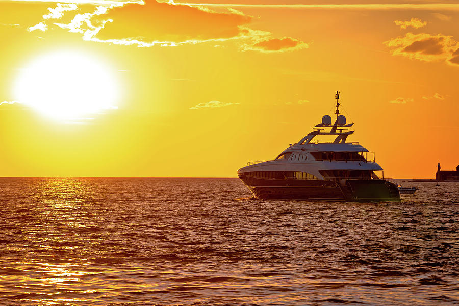 Luxury yacht on open sea at golden sunset Photograph by Brch Photography