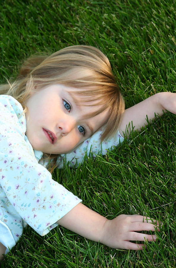 Girl Photograph - Lying in the Grass by Margie Wildblood Girl Photograph - Lying in the Grass by Margie Wildblood