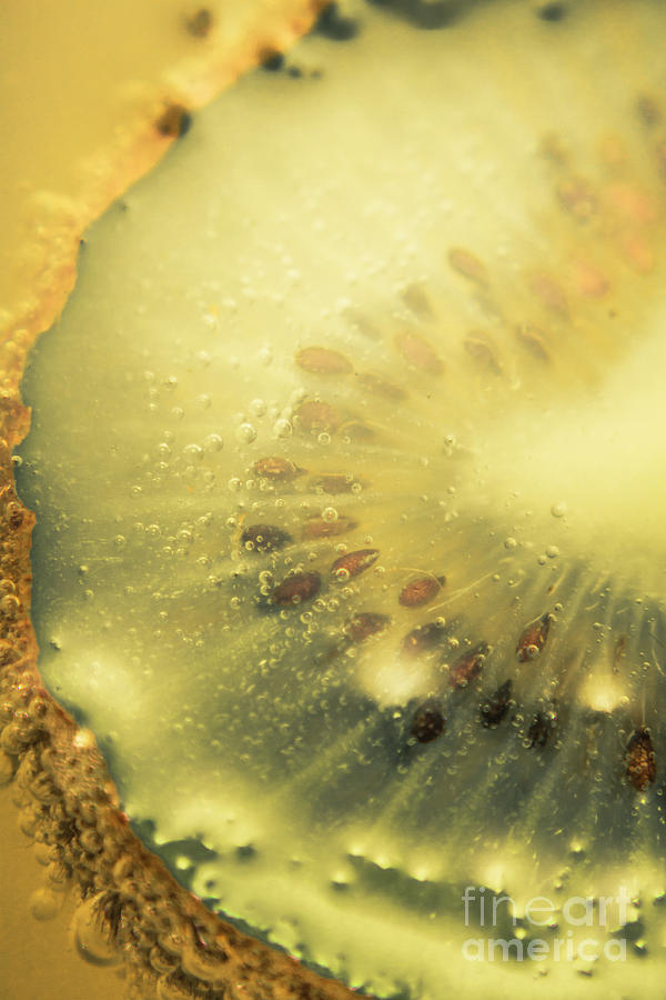 Macro shot of submerged kiwi fruit Photograph by Jorgo Photography