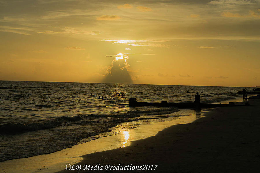 Madeira Beach sunset Photograph by Lynette Bell - Fine Art America