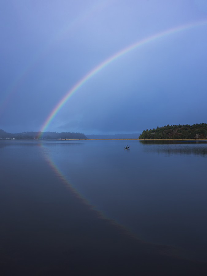 Magical Rainbow Reflection Photograph by Loree Johnson