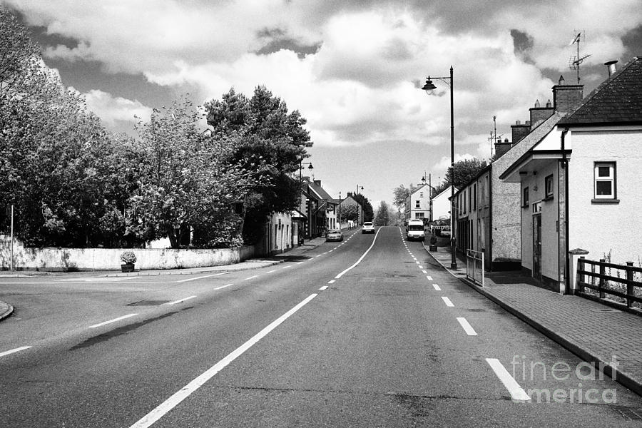 Main Photograph - Main Road Through Smithborough Village County Monaghan Republic Of Ireland by Joe Fox