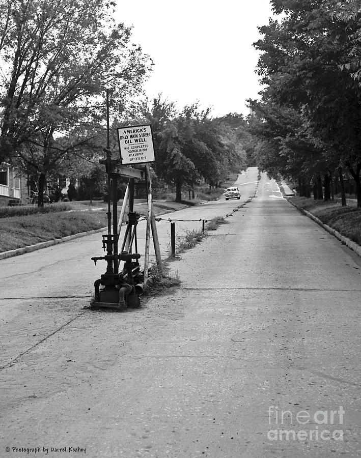 Main Street Oil Well Photograph by Larry Keahey