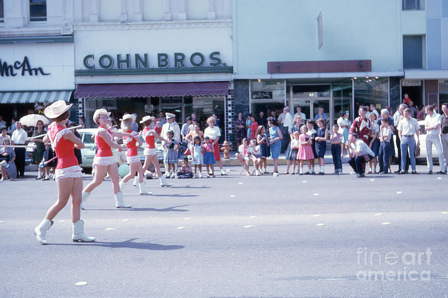 Austin Photograph - Majorettes marching on Congress Avenue during downtown Austin Parade by Dan Herron