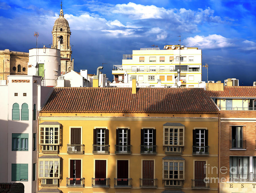 Malaga Clouds Photograph by John Rizzuto