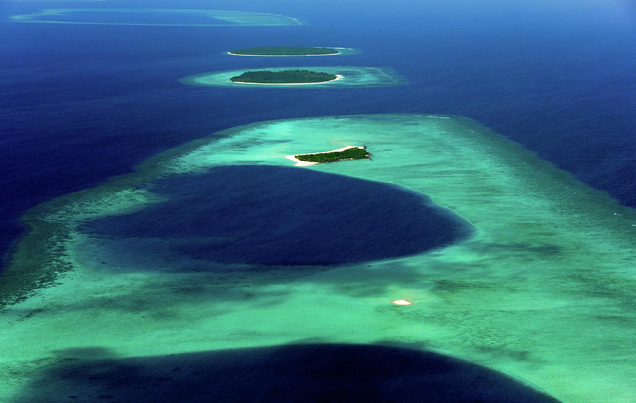 Maldivian Coral Islands in Blue Ocean Photograph by Jenny Rainbow