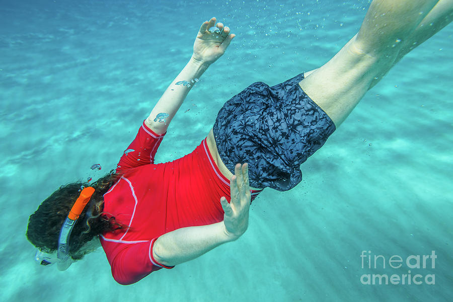 Male apnea underwater Photograph by Benny Marty