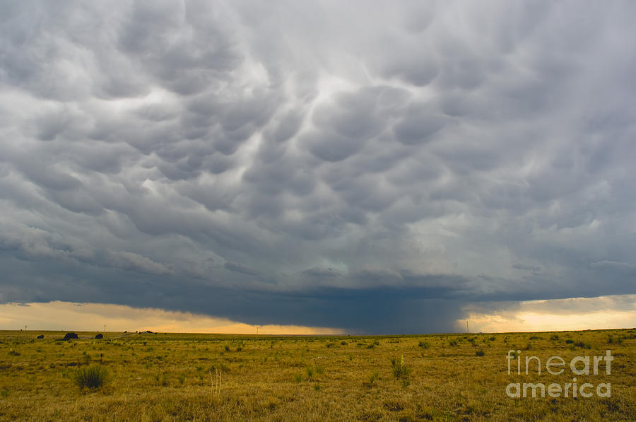 Landscape Photograph - Mammatus Clouds by Jim Reed
