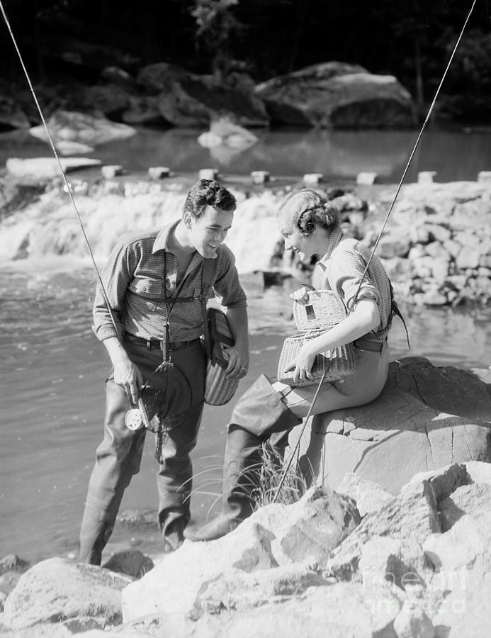 Man And Woman Fly Fishing Photograph by H. Armstrong Roberts/ClassicStock -  Fine Art America