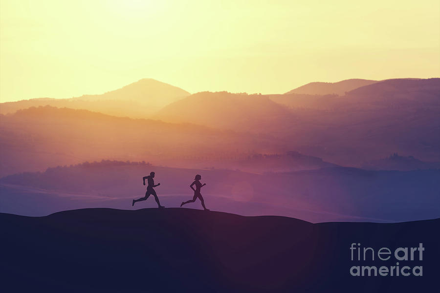 Man and woman running on a hill in the country Photograph by Michal Bednarek