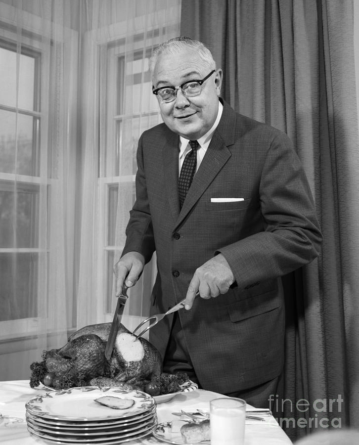 Man Carving Thanksgiving Turkey, C.1960s Photograph by H. Armstrong Roberts/ClassicStock