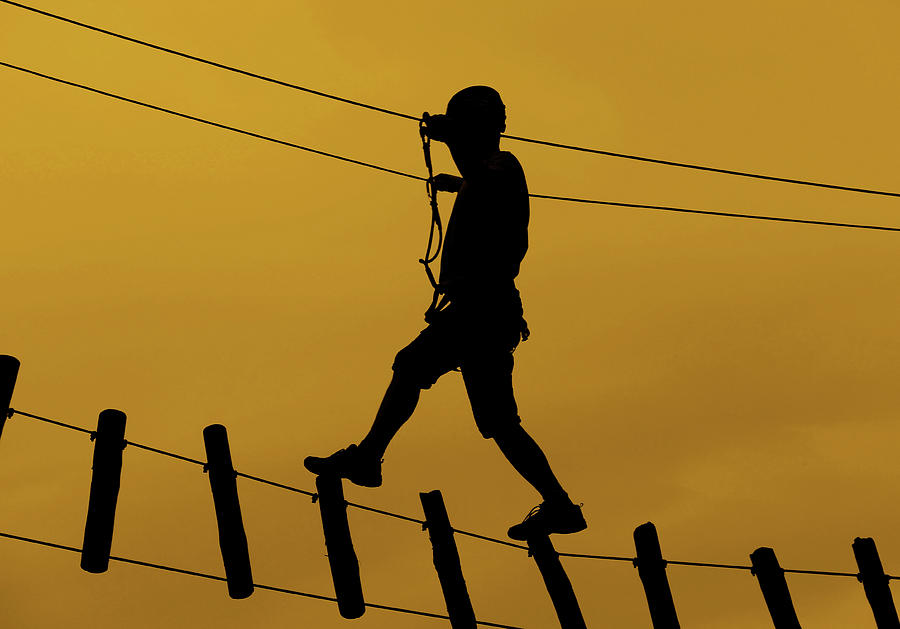 Man Crossing A Suspension Bridge Photograph By Bratislav Braca ...