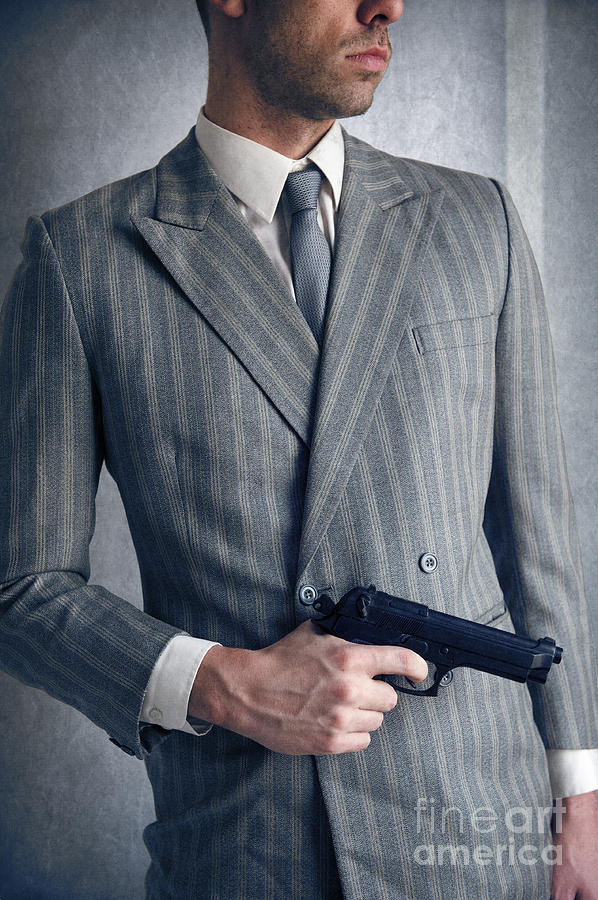 Man In A Double Breasted Suit Holding A Gun Photograph by Lee Avison