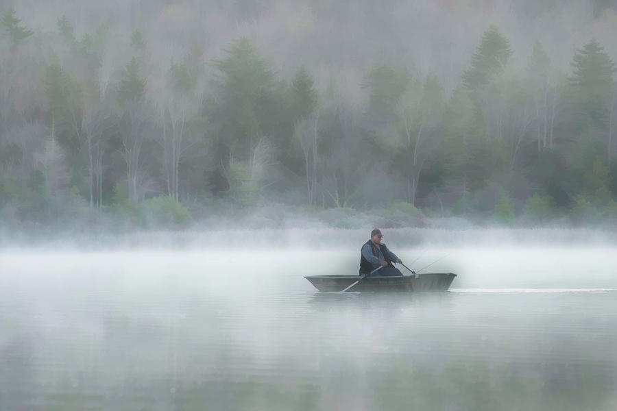 Man in boat on Spruce Knob Lake Photograph by Dan Friend