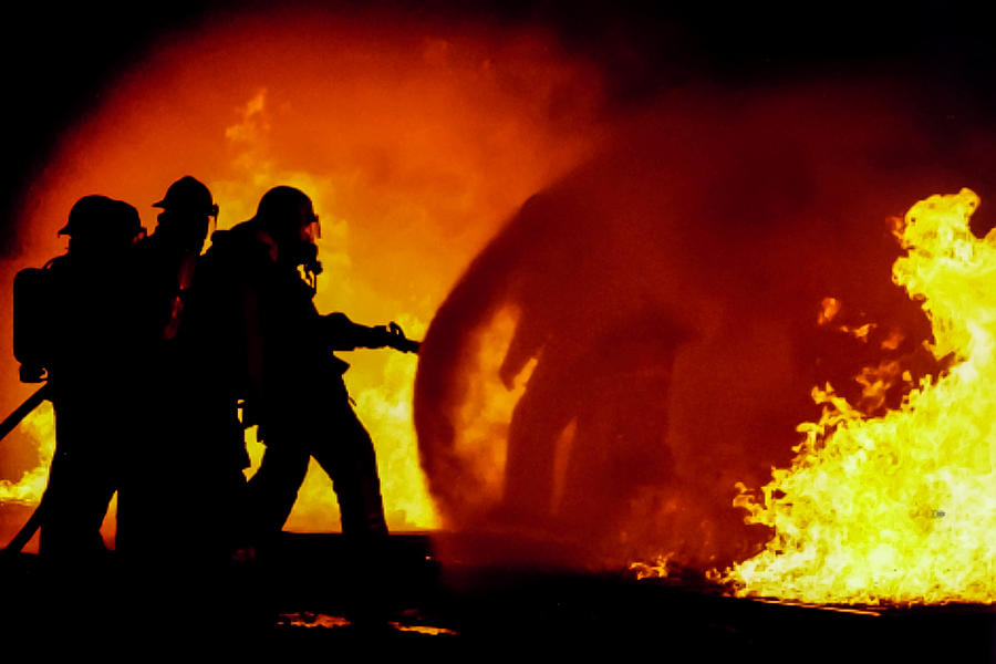 Man in Flames Photograph by Robert Wilder Jr