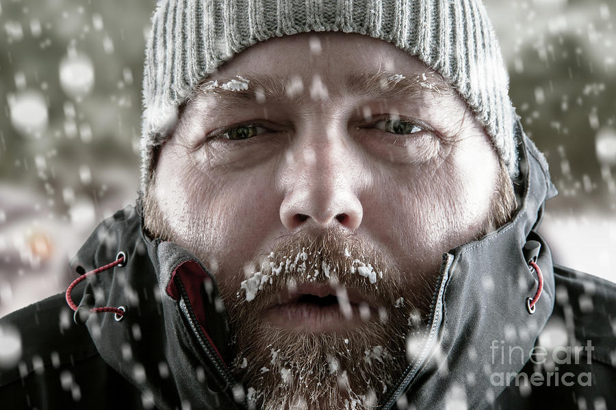 Man in snow storm close up Photograph by Simon Bratt