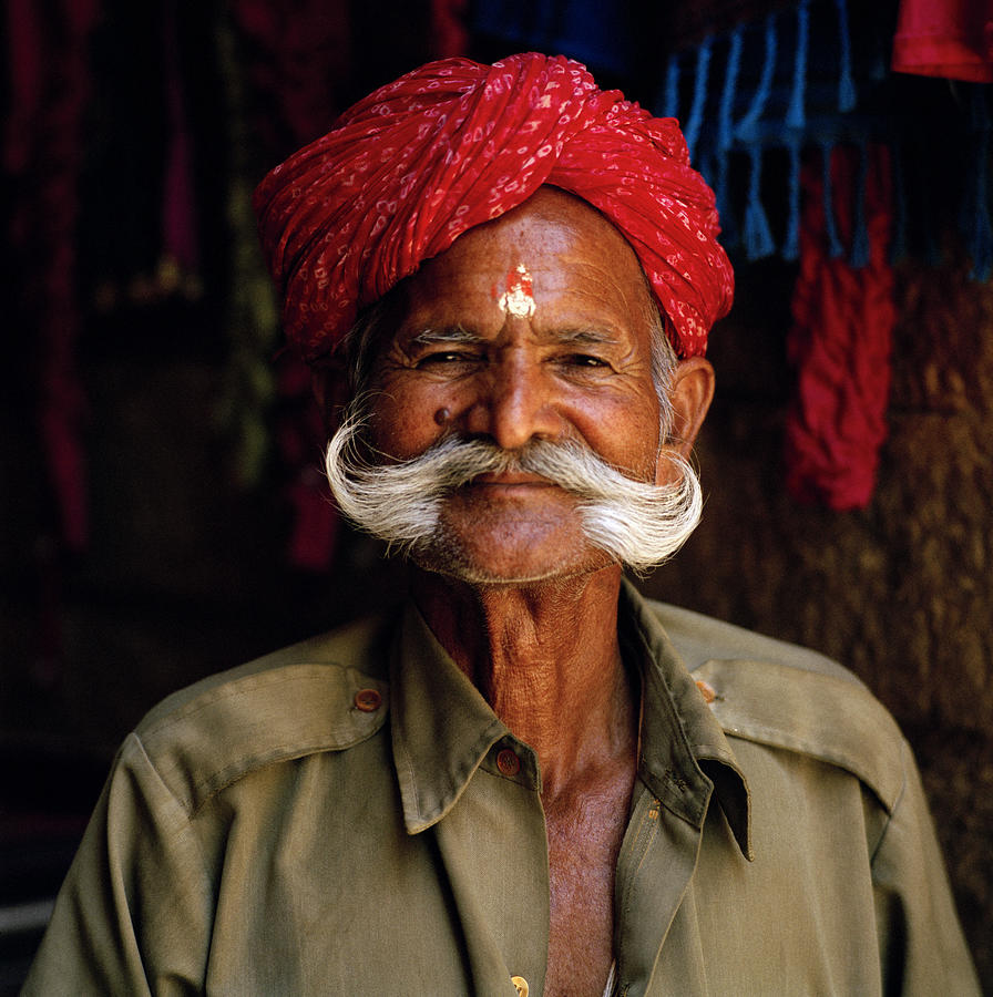 Rajasthani Man In The Red Turban Photograph by Shaun Higson