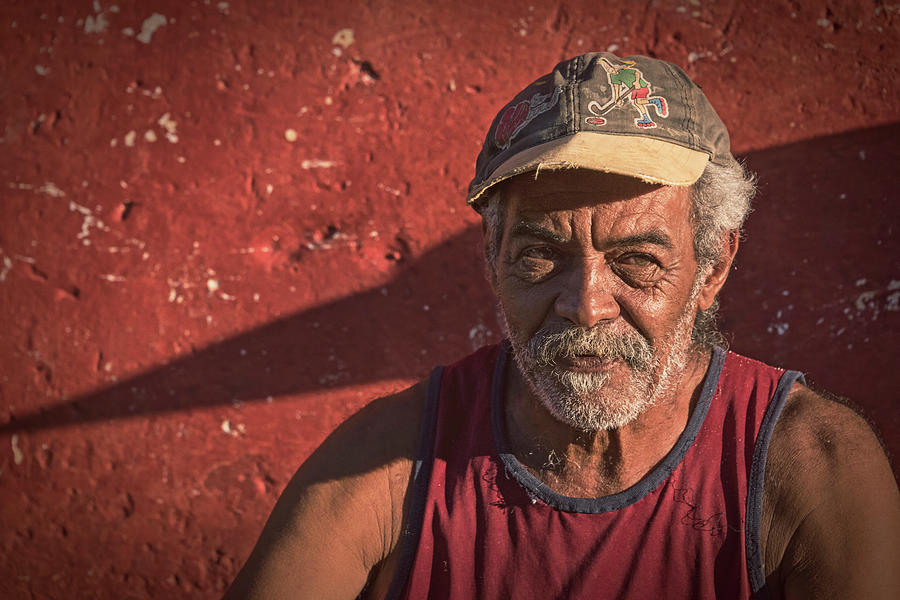 Man in Trinidad Cuba Photograph by Joan Carroll