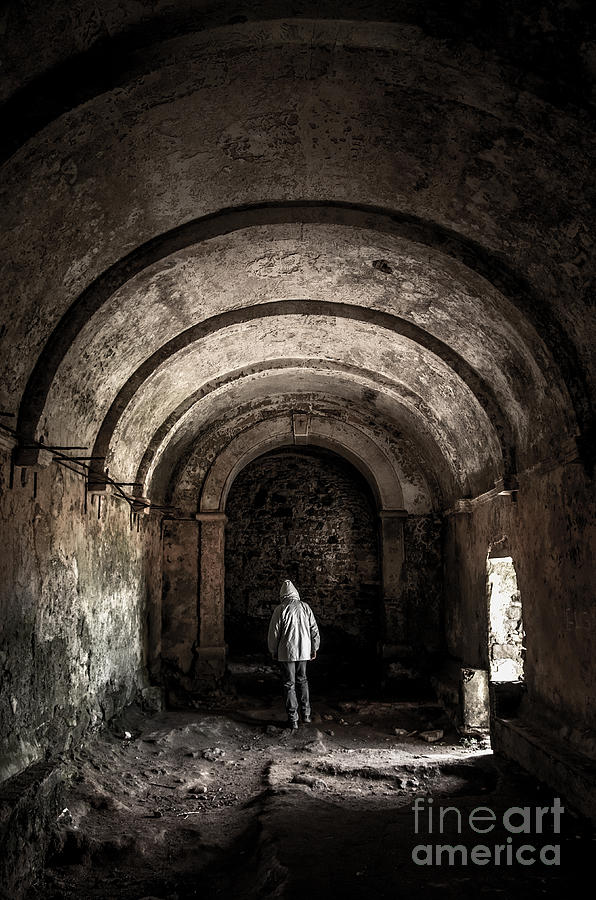 Man inside a ruined chapel Photograph by Carlos Caetano