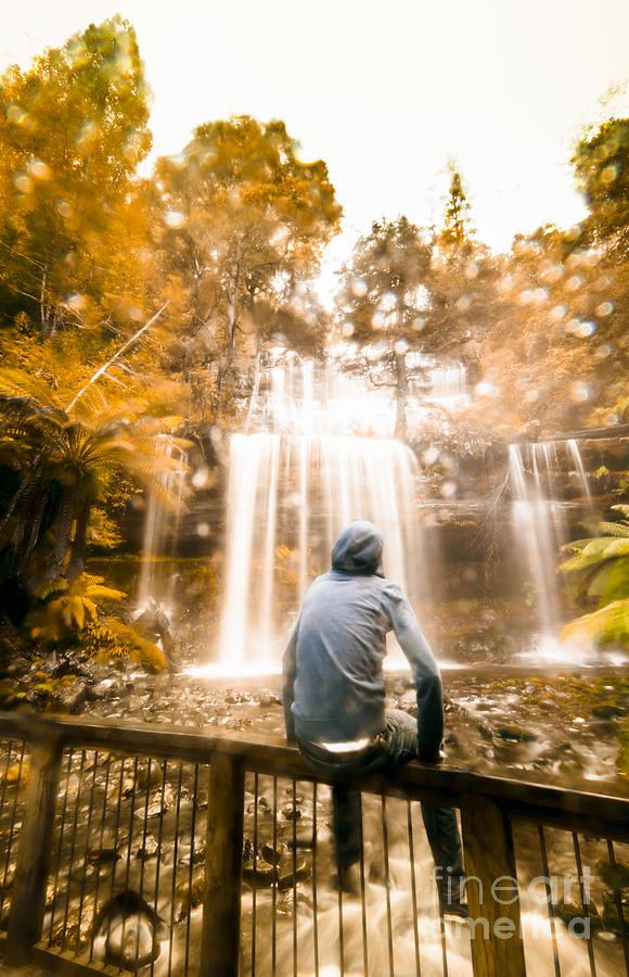 Man Looking At Waterfall Photograph