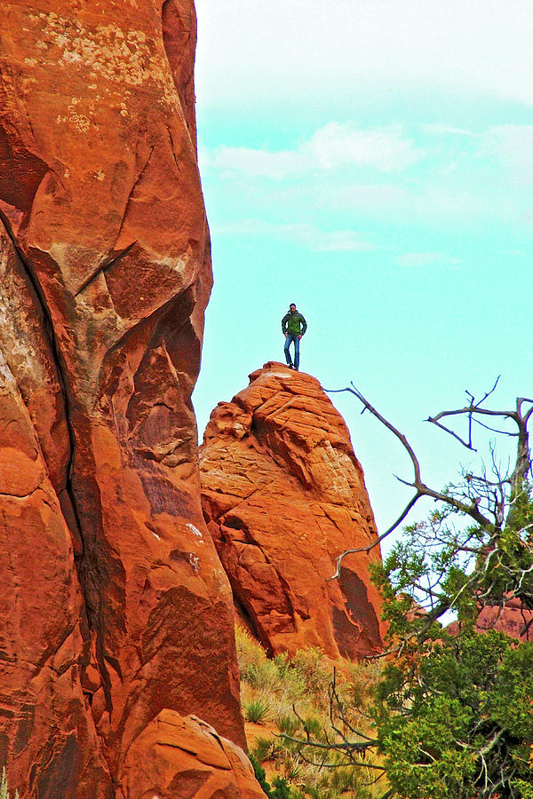 Man on a Rock by Pine Tree Arch along Devils Garden Trail in Arches  National Park, Utah Photograph by Ruth Hager