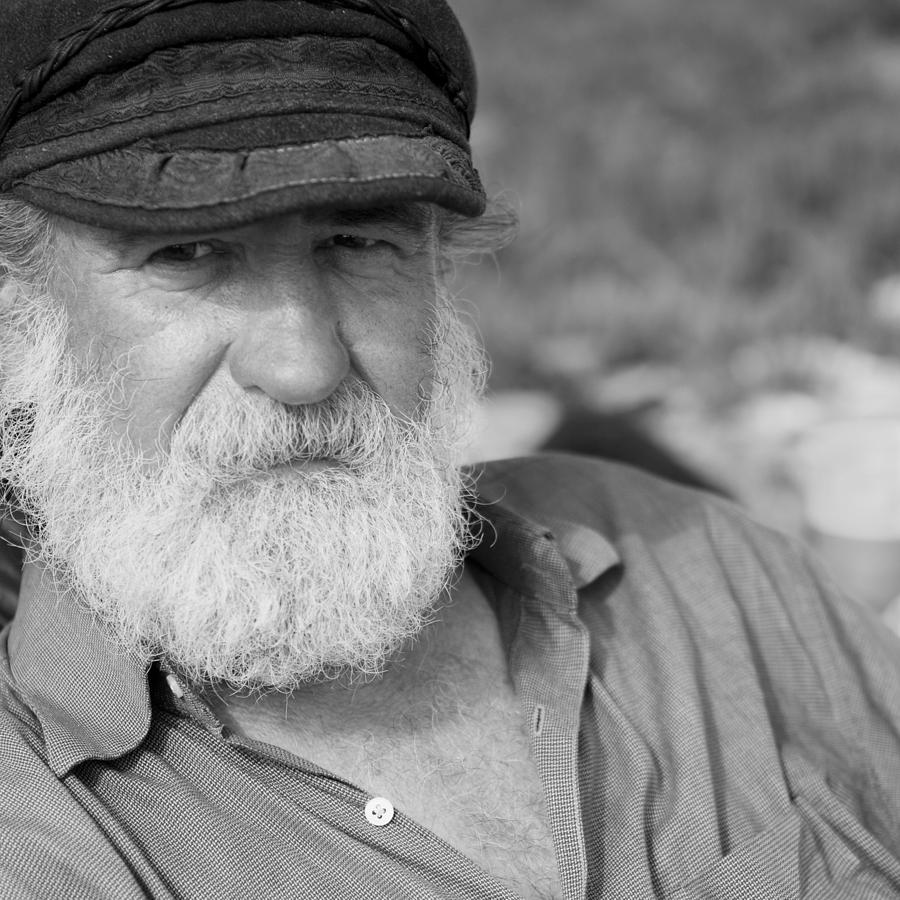 Man on the Beach Photograph by Nicole Swanger - Fine Art America