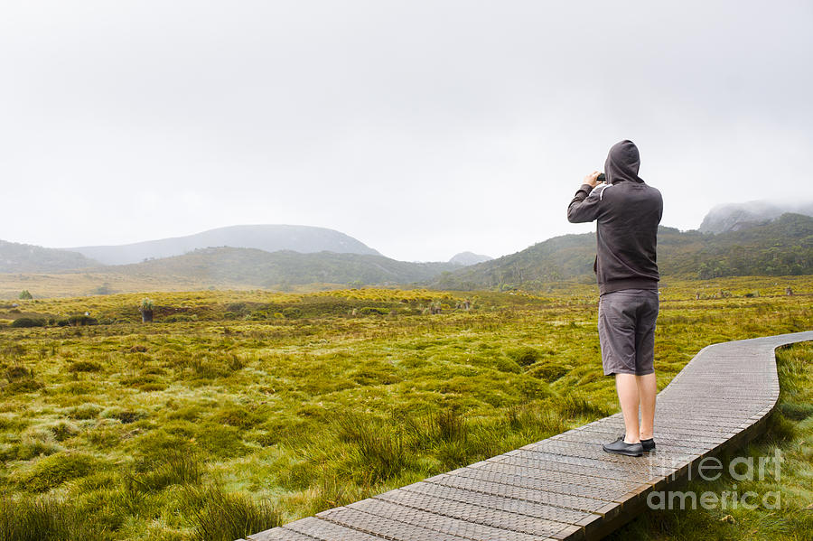 Memento Movie Photograph - Man on trekking holiday taking phone photograph by Jorgo Photography