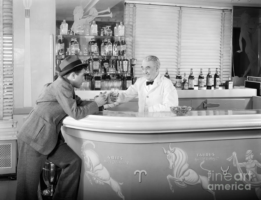 Bottle Photograph - Man Ordering Another Drink, C. 1940s by H. Armstrong Roberts/ClassicStock