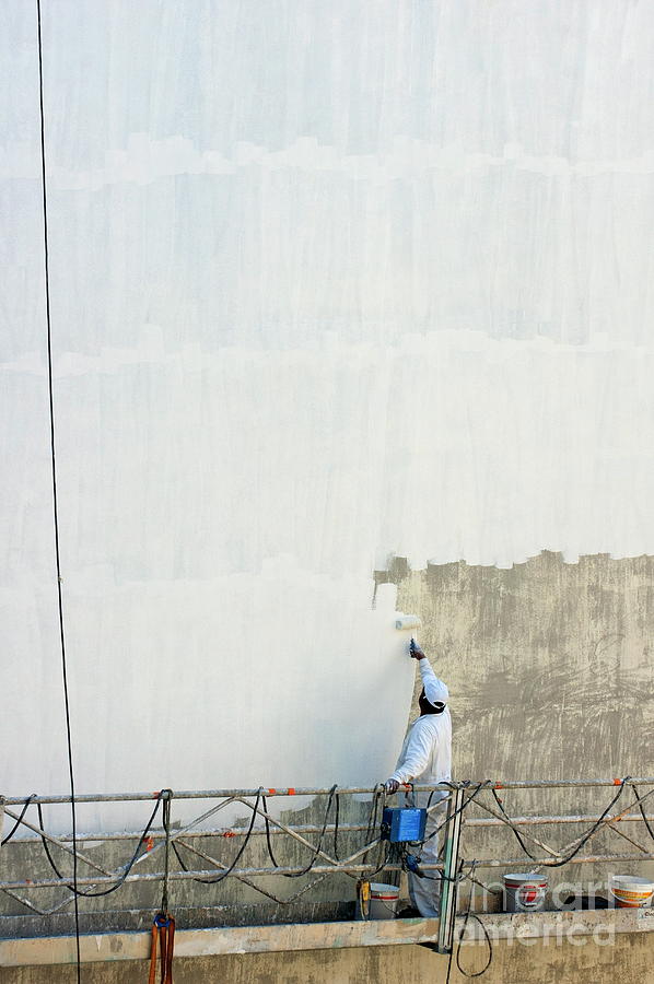 Man painting the facade of a building Photograph by Sami Sarkis Photography Man painting the facade of a building Photograph by Sami Sarkis Photography