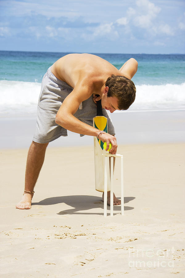 Man Playing Beach Cricket Photograph by Jorgo Photography