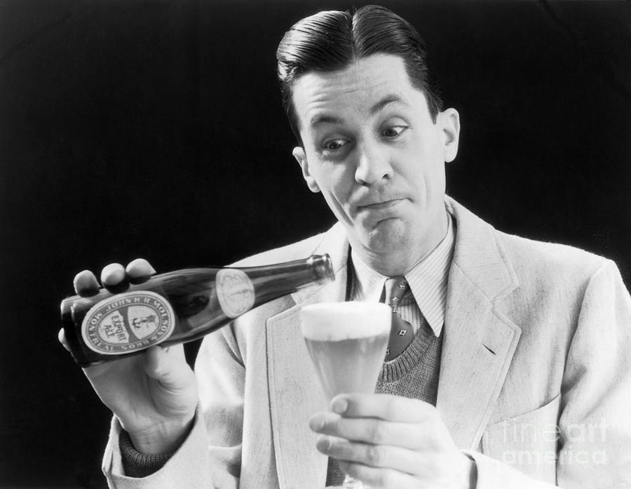 Man Pouring A Glass Of Beer, C.1930s Photograph by H. Armstrong Roberts/ClassicStock