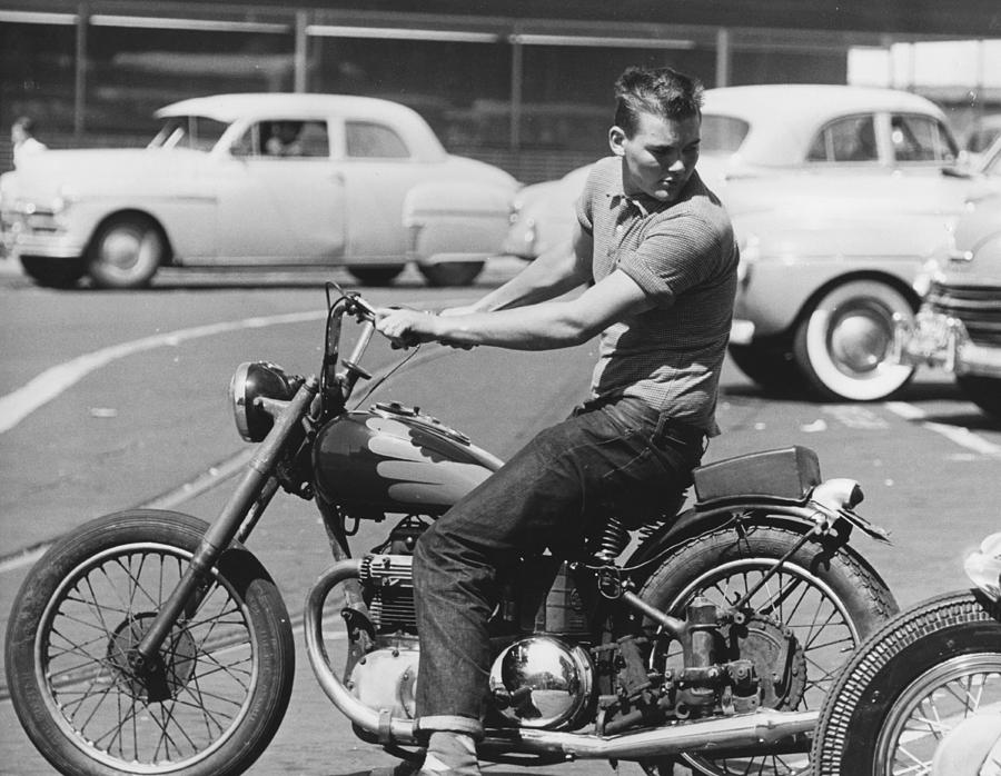 Man Riding A Motorcycle Photograph by Underwood Archives